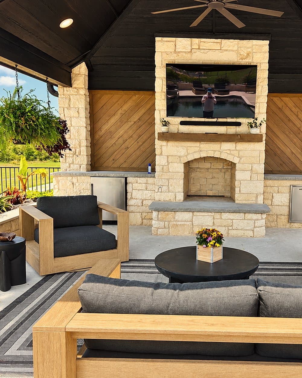 Limestone fireplace on a covered patio